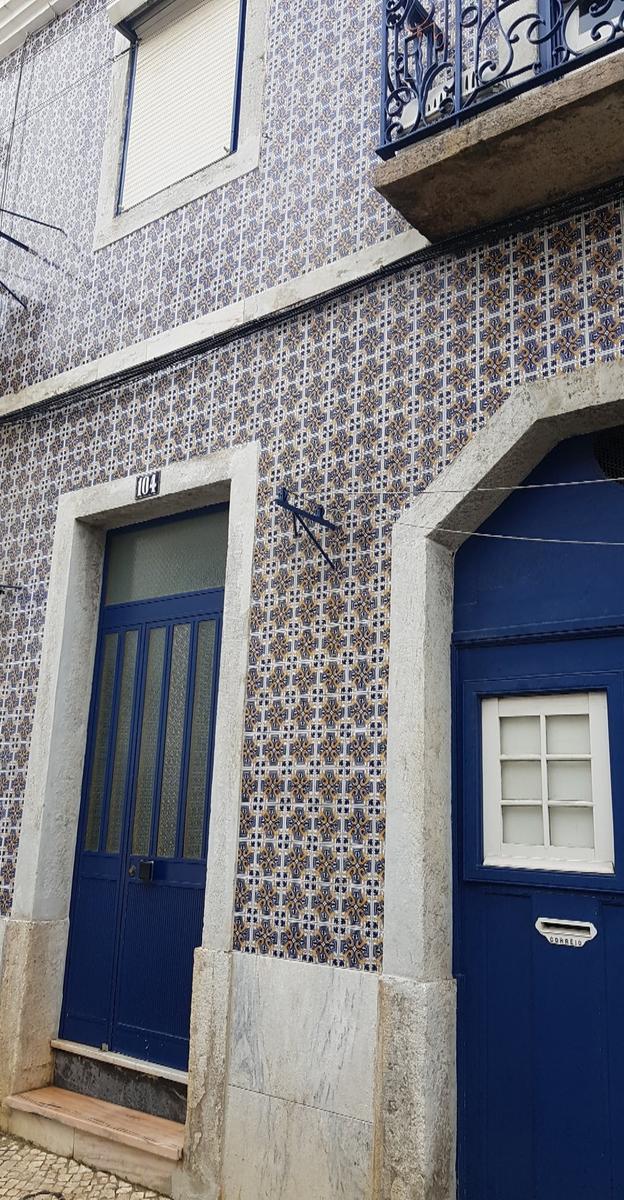 Lisbon blue and yellow tile building